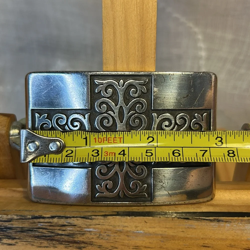 Celtic cross/decorative silver colored belt buckle made